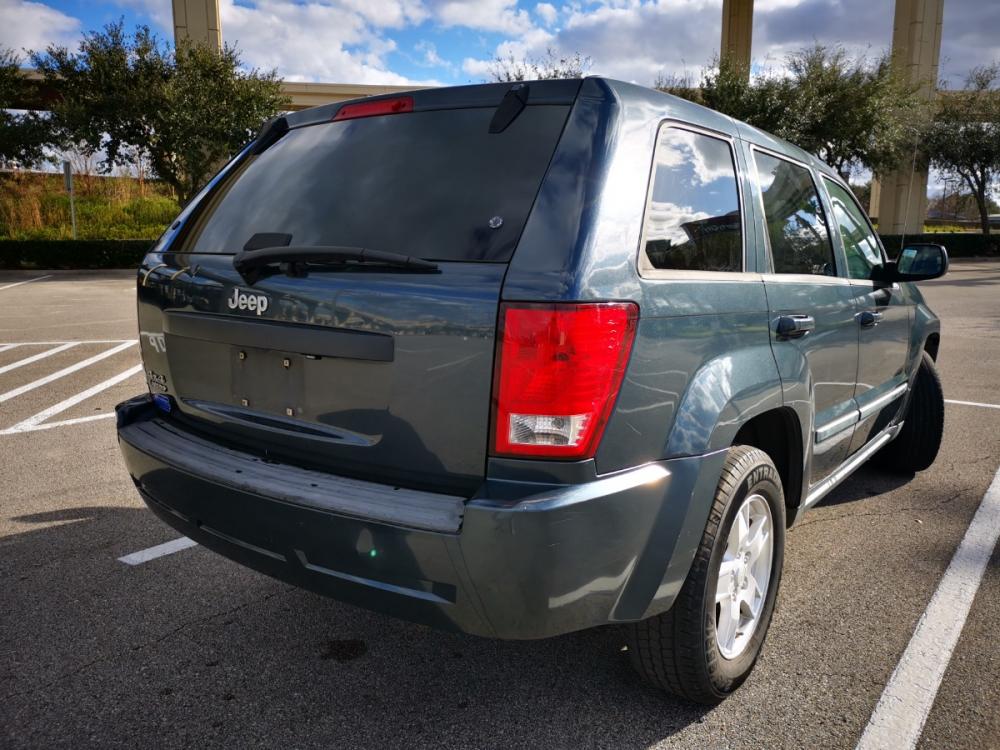 2007 blue Jeep Grand Cherokee Laredo 4WD (1J8GR48K87C) with an 3.7L V6 SOHC 12V engine, 5-Speed Automatic Overdrive transmission, located at 5005 Telephone Rd., Houston, TX, 77087, (713) 641-0980, 29.690666, -95.298683 - Photo #4