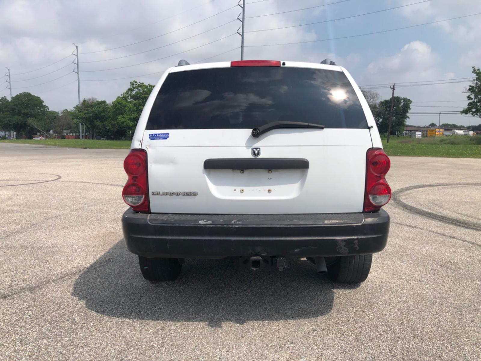 2005 white Dodge Durango ST 2WD (1D4HD38NX5F) with an 4.7L V8 SOHC 16V engine, located at 5005 Telephone Rd., Houston, TX, 77087, (713) 641-0980, 29.690666, -95.298683 - Photo #7