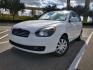 2009 white Hyundai Accent GLS 4-Door (KMHCN46C39U) with an 1.6L L4 DOHC 16V engine, located at 5005 Telephone Rd., Houston, TX, 77087, (713) 641-0980, 29.690666, -95.298683 - Photo #0