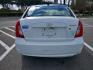 2009 white Hyundai Accent GLS 4-Door (KMHCN46C39U) with an 1.6L L4 DOHC 16V engine, located at 5005 Telephone Rd., Houston, TX, 77087, (713) 641-0980, 29.690666, -95.298683 - Photo #3