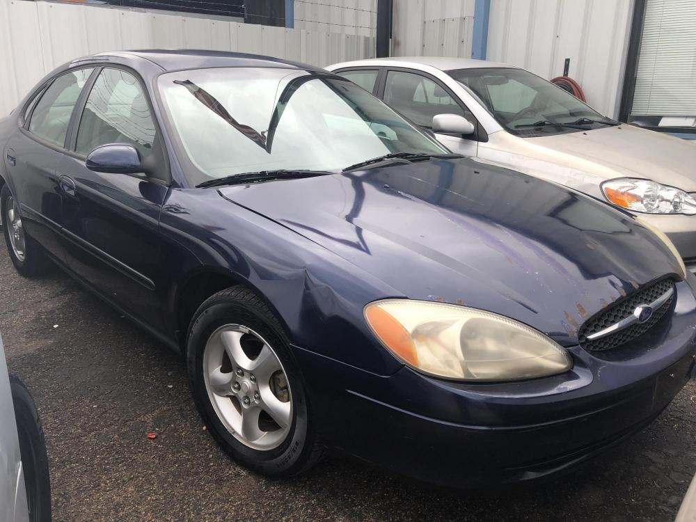 2001 Blue Ford Taurus SES (1FAFP55U81A) with an 3.0L V6 OHV 12V engine, 4-Speed Automatic Overdrive transmission, located at 5005 Telephone Rd., Houston, TX, 77087, (713) 641-0980, 29.690666, -95.298683 - Photo #0