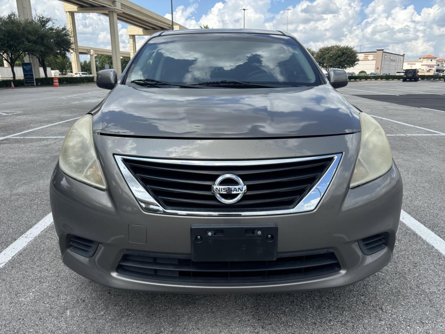 2013 Silver Nissan Versa 1.6 S 5M (3N1CN7AP7DL) with an 1.6L L4 DOHC 16V engine, 5-Speed Manual transmission, located at 5005 Telephone Rd., Houston, TX, 77087, (713) 641-0980, 29.690666, -95.298683 - Photo#1