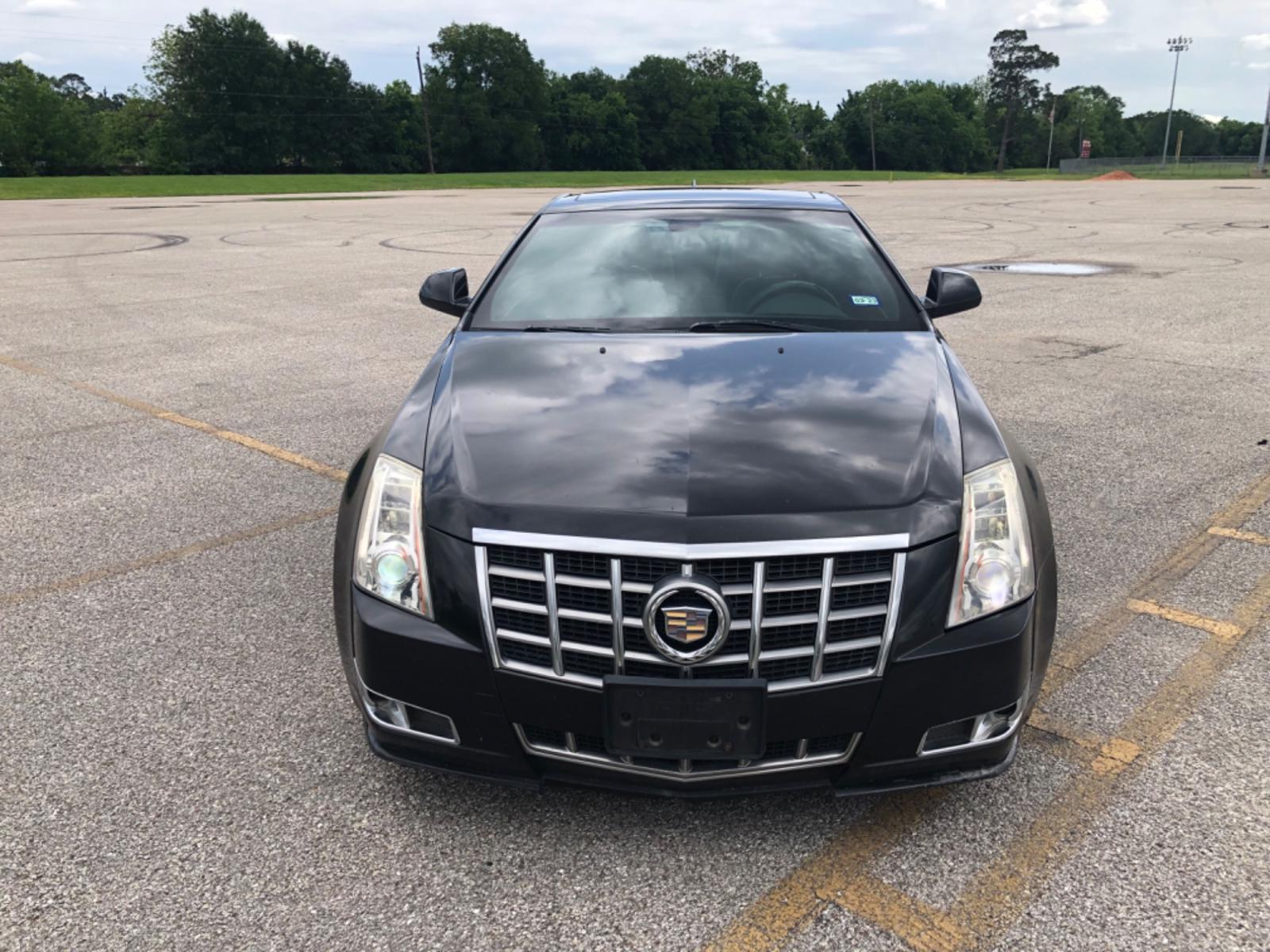 2012 Black Cadillac CTS Premium w/ Navi (1G6DP1E35C0) with an 3.6L V6 DOHC 24V FFV engine, 6-Speed Automatic transmission, located at 5005 Telephone Rd., Houston, TX, 77087, (713) 641-0980, 29.690666, -95.298683 - Photo #1