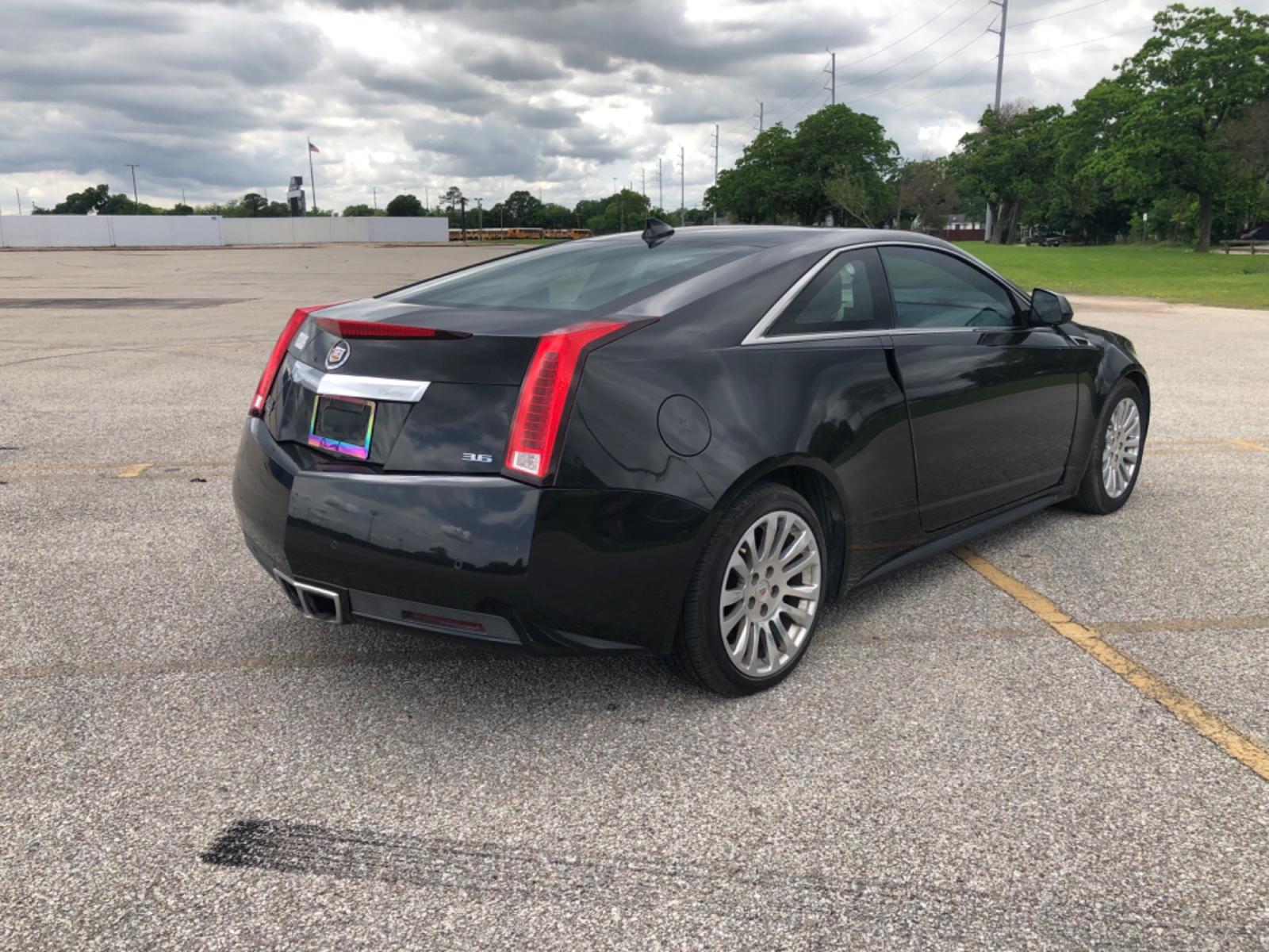 2012 Black Cadillac CTS Premium w/ Navi (1G6DP1E35C0) with an 3.6L V6 DOHC 24V FFV engine, 6-Speed Automatic transmission, located at 5005 Telephone Rd., Houston, TX, 77087, (713) 641-0980, 29.690666, -95.298683 - Photo #6