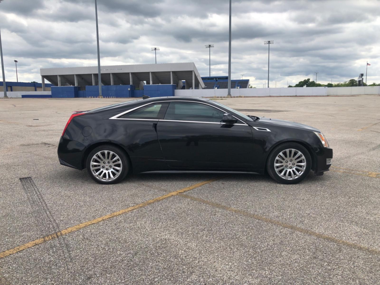 2012 Black Cadillac CTS Premium w/ Navi (1G6DP1E35C0) with an 3.6L V6 DOHC 24V FFV engine, 6-Speed Automatic transmission, located at 5005 Telephone Rd., Houston, TX, 77087, (713) 641-0980, 29.690666, -95.298683 - Photo #11