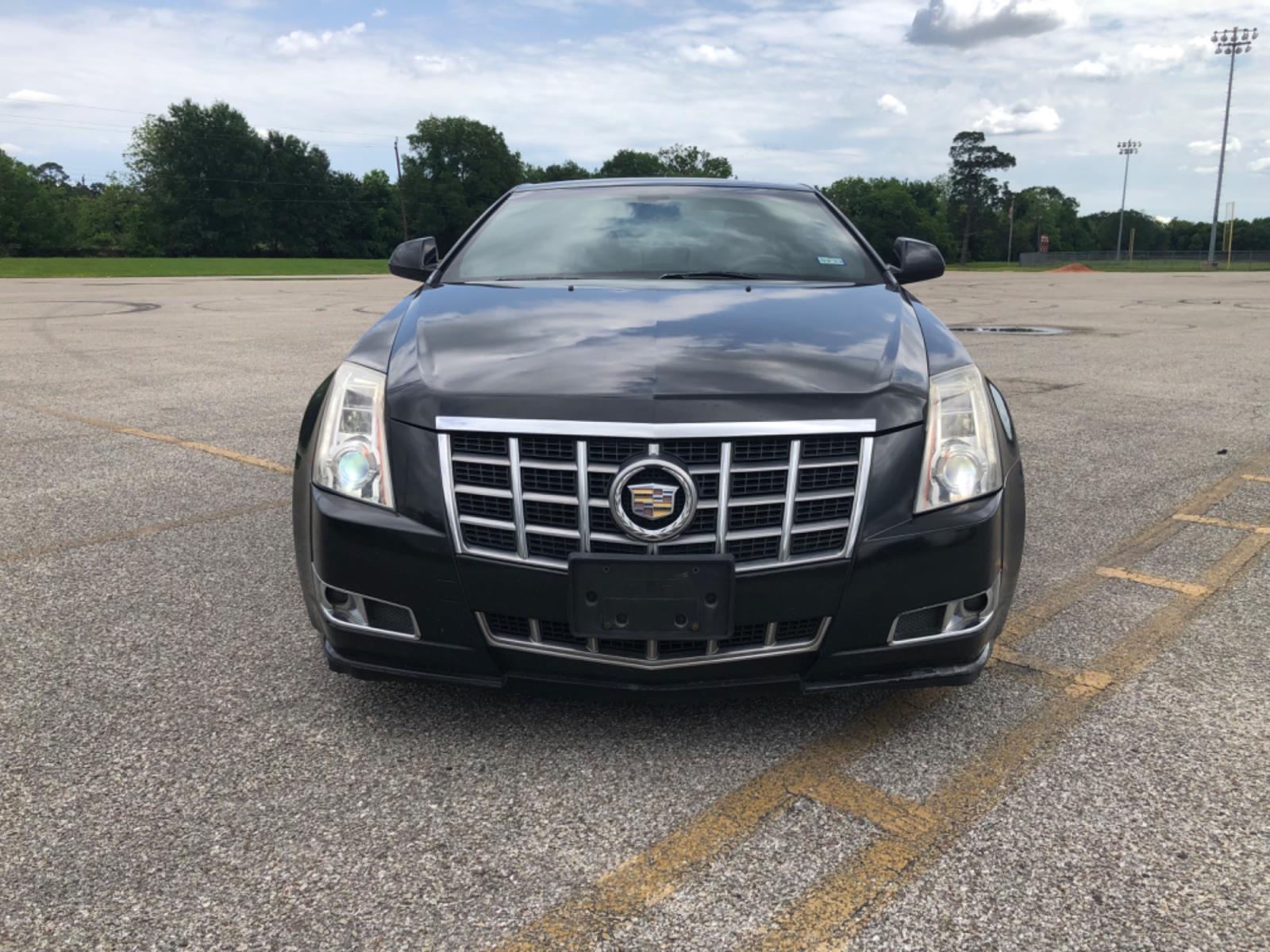 2012 Black Cadillac CTS Premium w/ Navi (1G6DP1E35C0) with an 3.6L V6 DOHC 24V FFV engine, 6-Speed Automatic transmission, located at 5005 Telephone Rd., Houston, TX, 77087, (713) 641-0980, 29.690666, -95.298683 - Photo #5