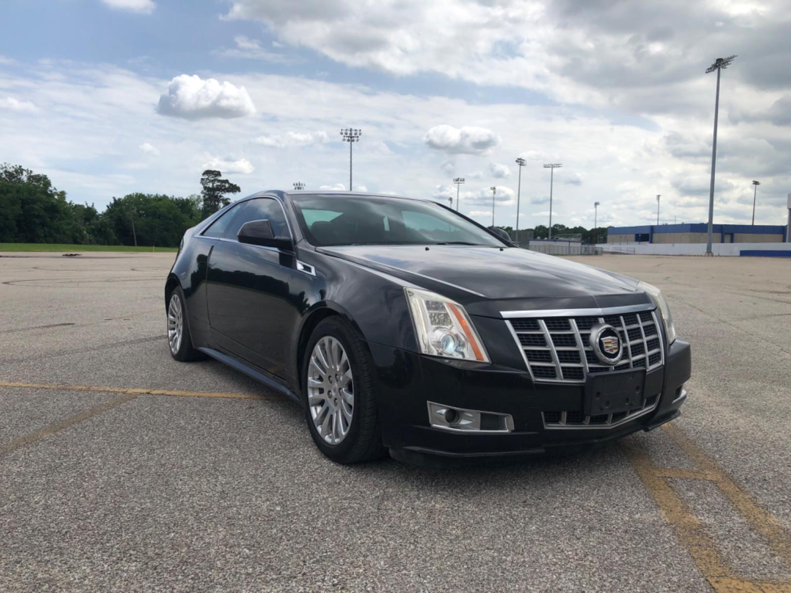 2012 Black Cadillac CTS Premium w/ Navi (1G6DP1E35C0) with an 3.6L V6 DOHC 24V FFV engine, 6-Speed Automatic transmission, located at 5005 Telephone Rd., Houston, TX, 77087, (713) 641-0980, 29.690666, -95.298683 - Photo #4