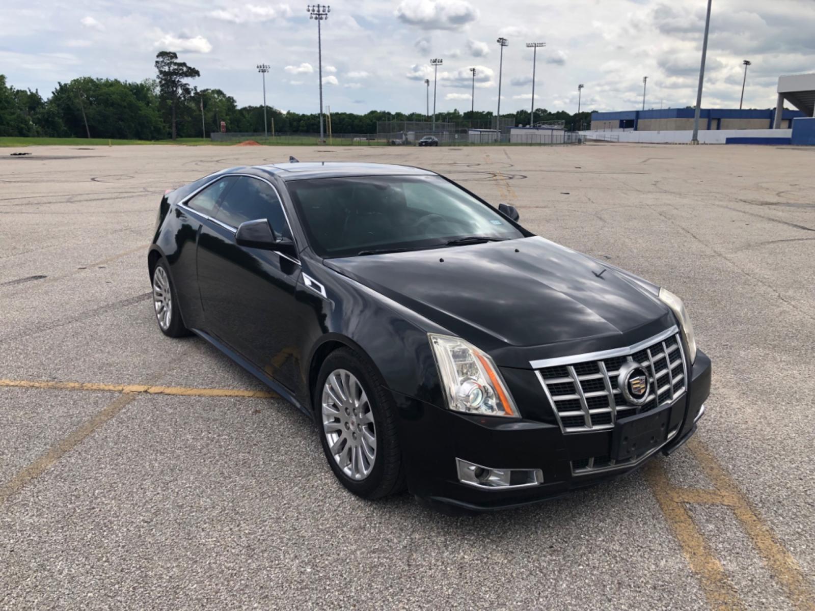 2012 Black Cadillac CTS Premium w/ Navi (1G6DP1E35C0) with an 3.6L V6 DOHC 24V FFV engine, 6-Speed Automatic transmission, located at 5005 Telephone Rd., Houston, TX, 77087, (713) 641-0980, 29.690666, -95.298683 - Photo #2