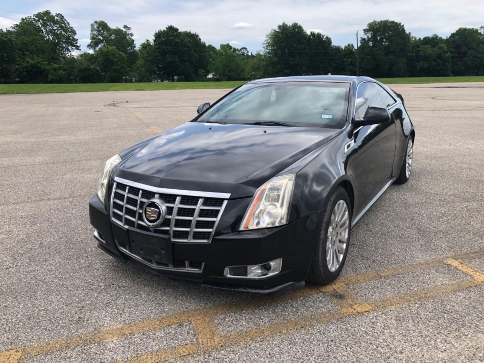 2012 Black Cadillac CTS Premium w/ Navi (1G6DP1E35C0) with an 3.6L V6 DOHC 24V FFV engine, 6-Speed Automatic transmission, located at 5005 Telephone Rd., Houston, TX, 77087, (713) 641-0980, 29.690666, -95.298683 - Photo #0