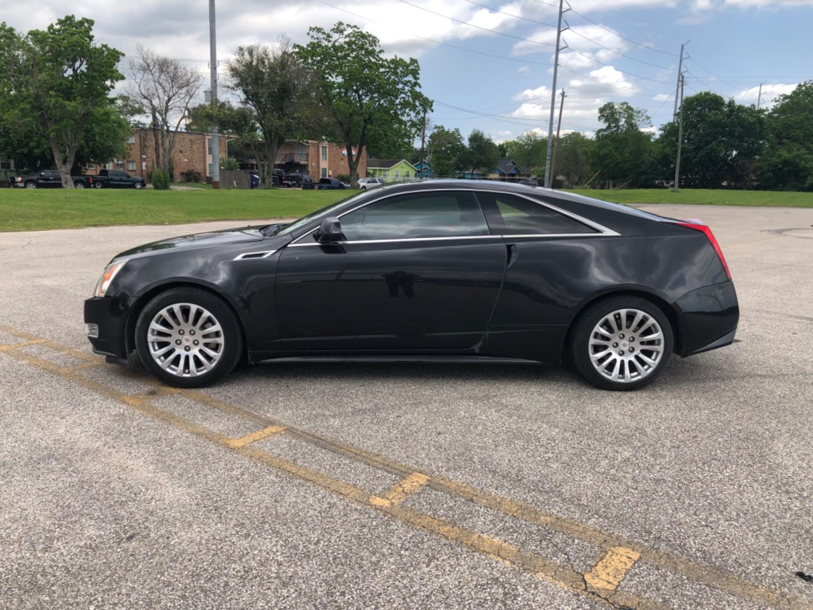 2012 Black Cadillac CTS Premium w/ Navi (1G6DP1E35C0) with an 3.6L V6 DOHC 24V FFV engine, 6-Speed Automatic transmission, located at 5005 Telephone Rd., Houston, TX, 77087, (713) 641-0980, 29.690666, -95.298683 - Photo #9