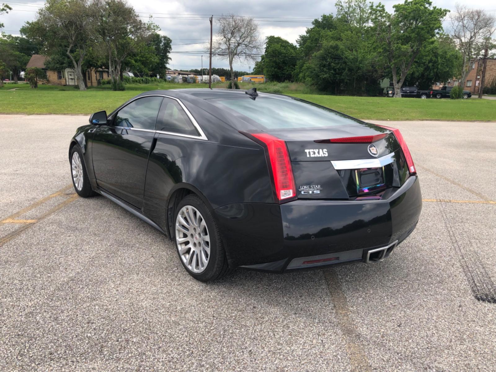 2012 Black Cadillac CTS Premium w/ Navi (1G6DP1E35C0) with an 3.6L V6 DOHC 24V FFV engine, 6-Speed Automatic transmission, located at 5005 Telephone Rd., Houston, TX, 77087, (713) 641-0980, 29.690666, -95.298683 - Photo #7