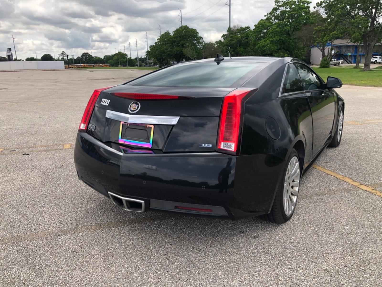 2012 Black Cadillac CTS Premium w/ Navi (1G6DP1E35C0) with an 3.6L V6 DOHC 24V FFV engine, 6-Speed Automatic transmission, located at 5005 Telephone Rd., Houston, TX, 77087, (713) 641-0980, 29.690666, -95.298683 - Photo #3