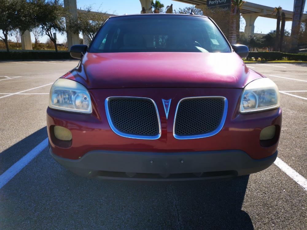 2005 Red Pontiac Montana SV6 1SA FWD (1GMDV33LX5D) with an 3.5L V6 OHV 12V engine, 4-Speed Automatic Overdrive transmission, located at 5005 Telephone Rd., Houston, TX, 77087, (713) 641-0980, 29.690666, -95.298683 - Photo #1