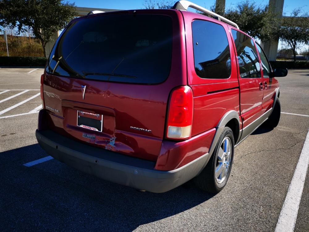 2005 Red Pontiac Montana SV6 1SA FWD (1GMDV33LX5D) with an 3.5L V6 OHV 12V engine, 4-Speed Automatic Overdrive transmission, located at 5005 Telephone Rd., Houston, TX, 77087, (713) 641-0980, 29.690666, -95.298683 - Photo #4