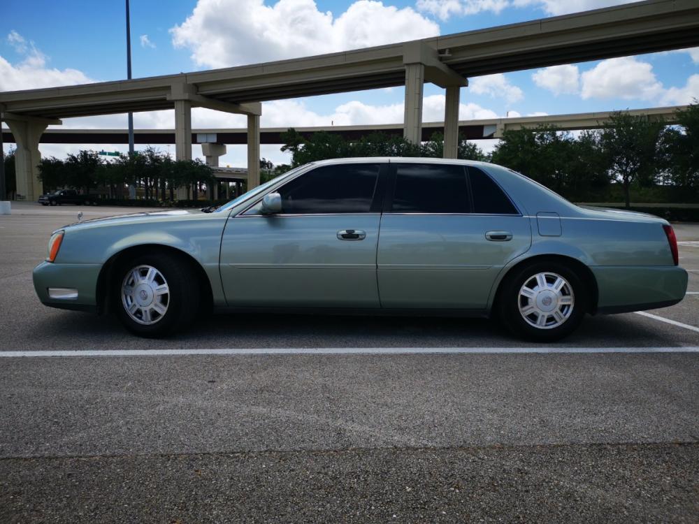 2005 Gold Cadillac Deville Sedan (1G6KD54YX5U) with an 4.6L V8 DOHC 32V engine, 4-Speed Automatic Overdrive transmission, located at 5005 Telephone Rd., Houston, TX, 77087, (713) 641-0980, 29.690666, -95.298683 - Photo #2