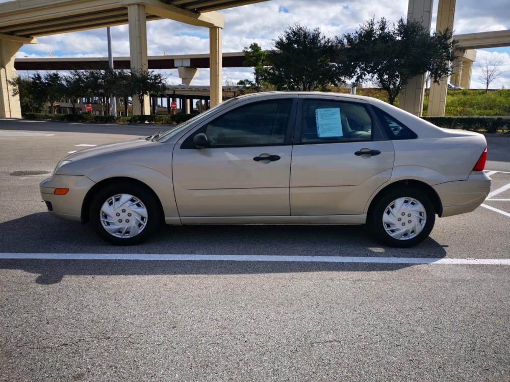2007 Tan Ford Focus ZX4 S (1FAFP34N17W) with an 2.0L L4 DOHC 16V engine, located at 5005 Telephone Rd., Houston, TX, 77087, (713) 641-0980, 29.690666, -95.298683 - Photo #2
