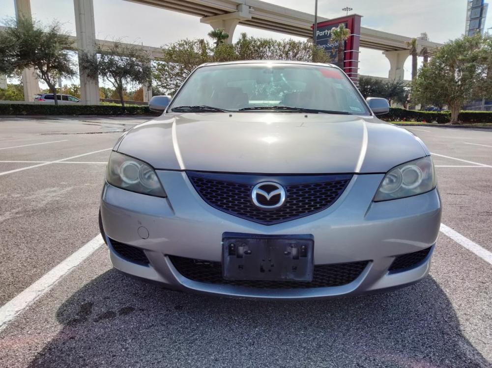 2005 Gray Mazda MAZDA3 i 4-door (JM1BK12F751) with an 2.0L L4 DOHC 16V engine, located at 5005 Telephone Rd., Houston, TX, 77087, (713) 641-0980, 29.690666, -95.298683 - Photo #2