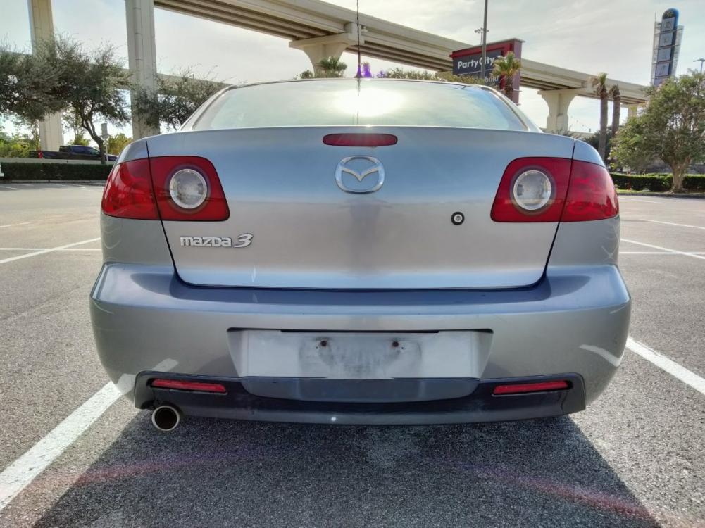 2005 Gray Mazda MAZDA3 i 4-door (JM1BK12F751) with an 2.0L L4 DOHC 16V engine, located at 5005 Telephone Rd., Houston, TX, 77087, (713) 641-0980, 29.690666, -95.298683 - Photo #4