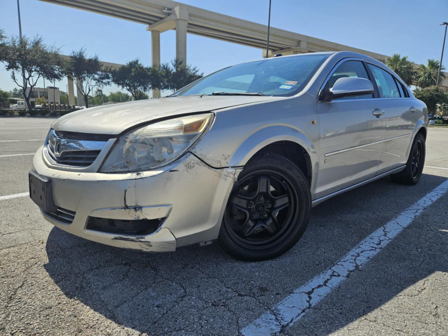 2007 silver Saturn Aura XE (1G8ZS57N17F) with an 3.5L V6 12V OHV engine, 4-Speed Automatic Overdrive transmission, located at 5005 Telephone Rd., Houston, TX, 77087, (713) 641-0980, 29.690666, -95.298683 - Photo#0