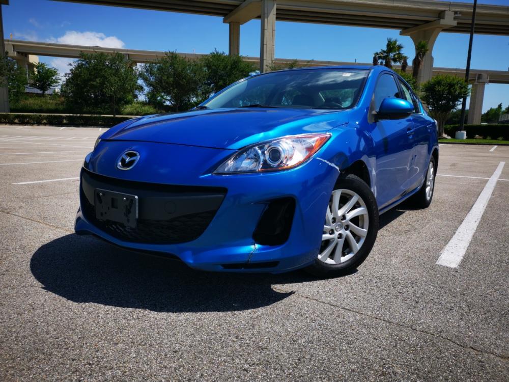 2012 Blue Mazda MAZDA3 i Touring 4-Door (JM1BL1V70C1) with an 2.0L L4 DOHC 16V engine, located at 5005 Telephone Rd., Houston, TX, 77087, (713) 641-0980, 29.690666, -95.298683 - Photo #0