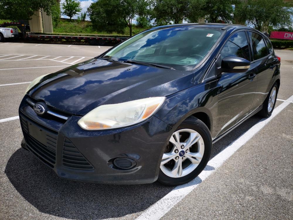 2014 black Ford Focus SE Hatch (1FADP3K28EL) with an 2.0L L4 DOHC 16V engine, located at 5005 Telephone Rd., Houston, TX, 77087, (713) 641-0980, 29.690666, -95.298683 - Photo #0