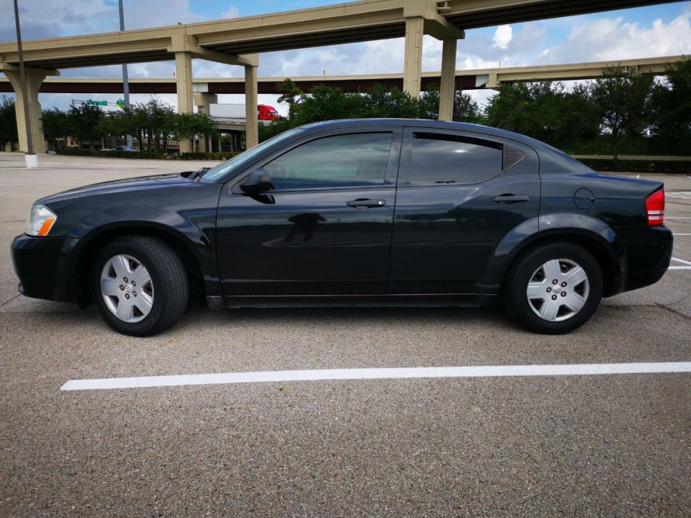 2010 black Dodge Avenger SXT (1B3CC4FB5AN) with an 2.4L L4 DOHC 16V engine, 4-Speed Automatic transmission, located at 5005 Telephone Rd., Houston, TX, 77087, (713) 641-0980, 29.690666, -95.298683 - Photo #2