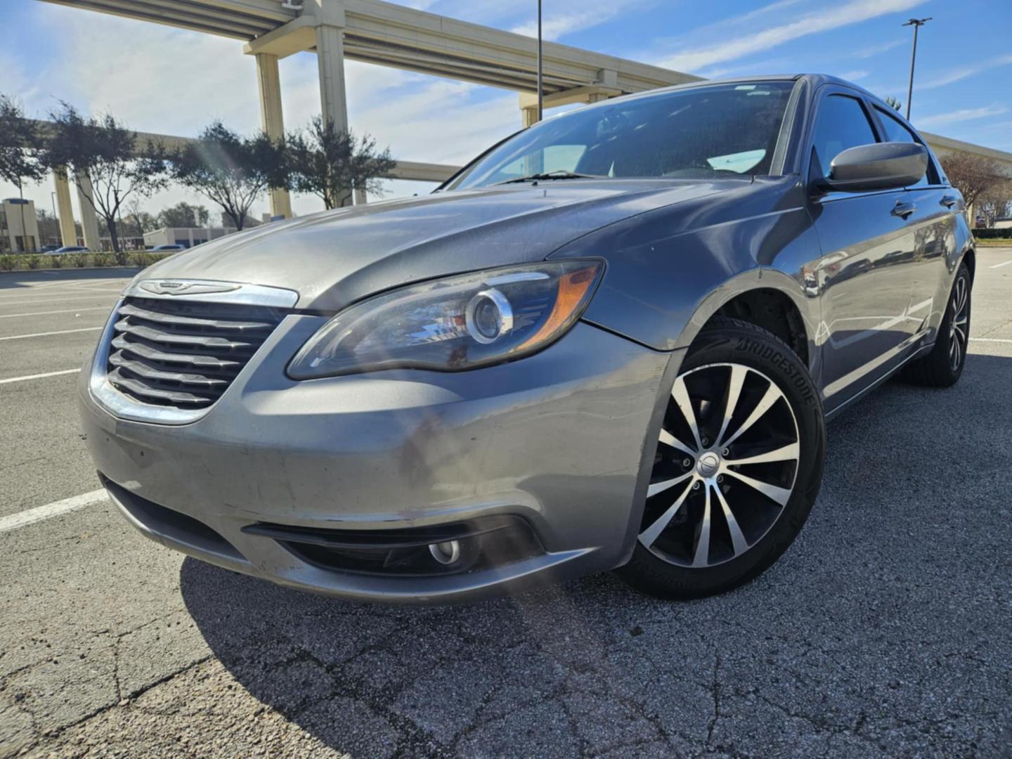 2013 Gray Chrysler 200 Touring (1C3CCBBB9DN) with an 2.4L L4 DOHC 16V engine, 6-Speed Automatic transmission, located at 5005 Telephone Rd., Houston, TX, 77087, (713) 641-0980, 29.690666, -95.298683 - Photo#0