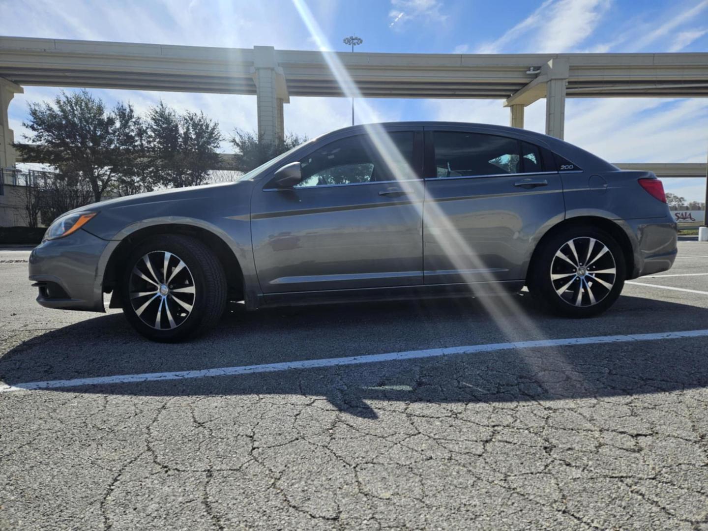 2013 Gray Chrysler 200 Touring (1C3CCBBB9DN) with an 2.4L L4 DOHC 16V engine, 6-Speed Automatic transmission, located at 5005 Telephone Rd., Houston, TX, 77087, (713) 641-0980, 29.690666, -95.298683 - Photo#2