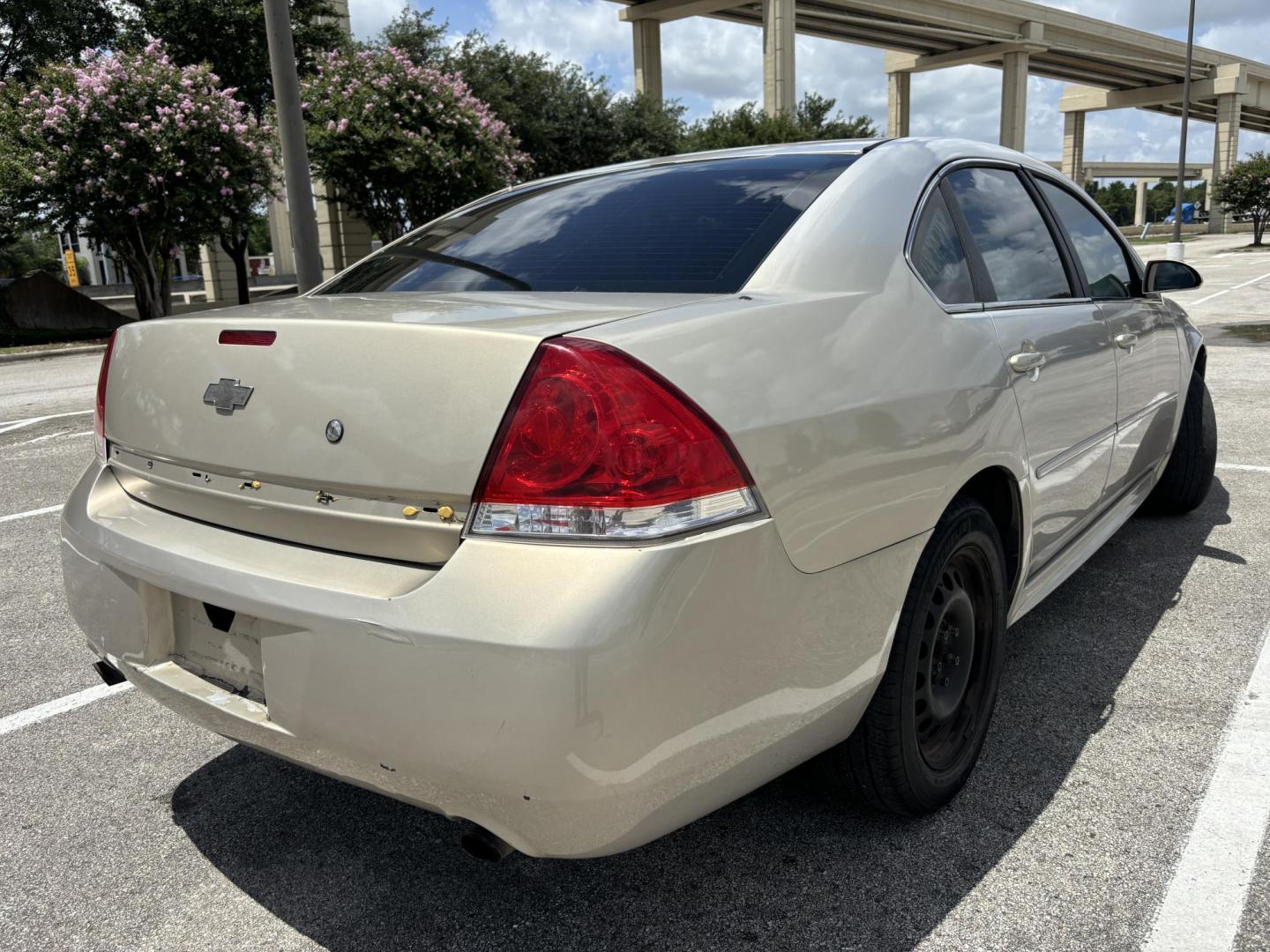 2012 Tan Chevrolet Impala Police Cruiser (2G1WD5E30C1) with an 3.6L V6 DOHC 16V FFV engine, 6-Speed Automatic transmission, located at 5005 Telephone Rd., Houston, TX, 77087, (713) 641-0980, 29.690666, -95.298683 - Photo#4