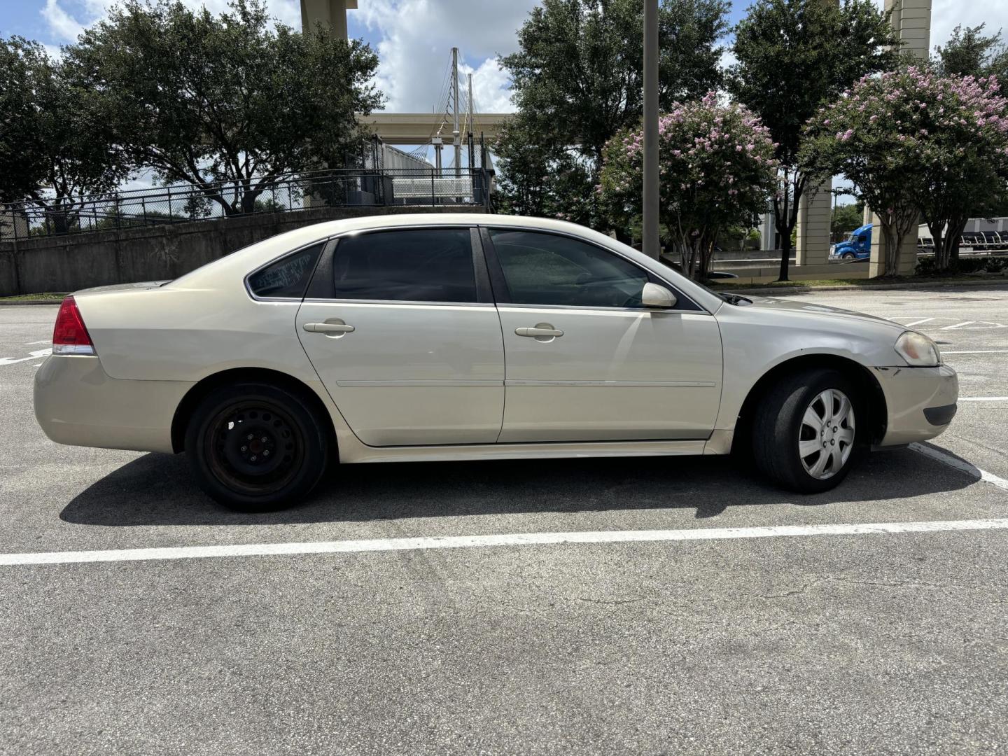 2012 Tan Chevrolet Impala Police Cruiser (2G1WD5E30C1) with an 3.6L V6 DOHC 16V FFV engine, 6-Speed Automatic transmission, located at 5005 Telephone Rd., Houston, TX, 77087, (713) 641-0980, 29.690666, -95.298683 - Photo#5