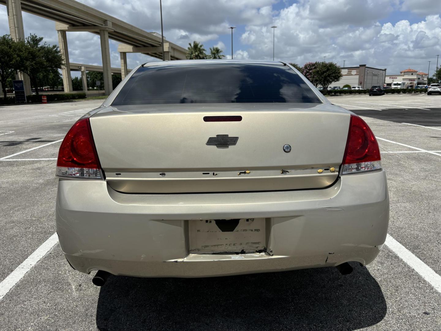 2012 Tan Chevrolet Impala Police Cruiser (2G1WD5E30C1) with an 3.6L V6 DOHC 16V FFV engine, 6-Speed Automatic transmission, located at 5005 Telephone Rd., Houston, TX, 77087, (713) 641-0980, 29.690666, -95.298683 - Photo#3
