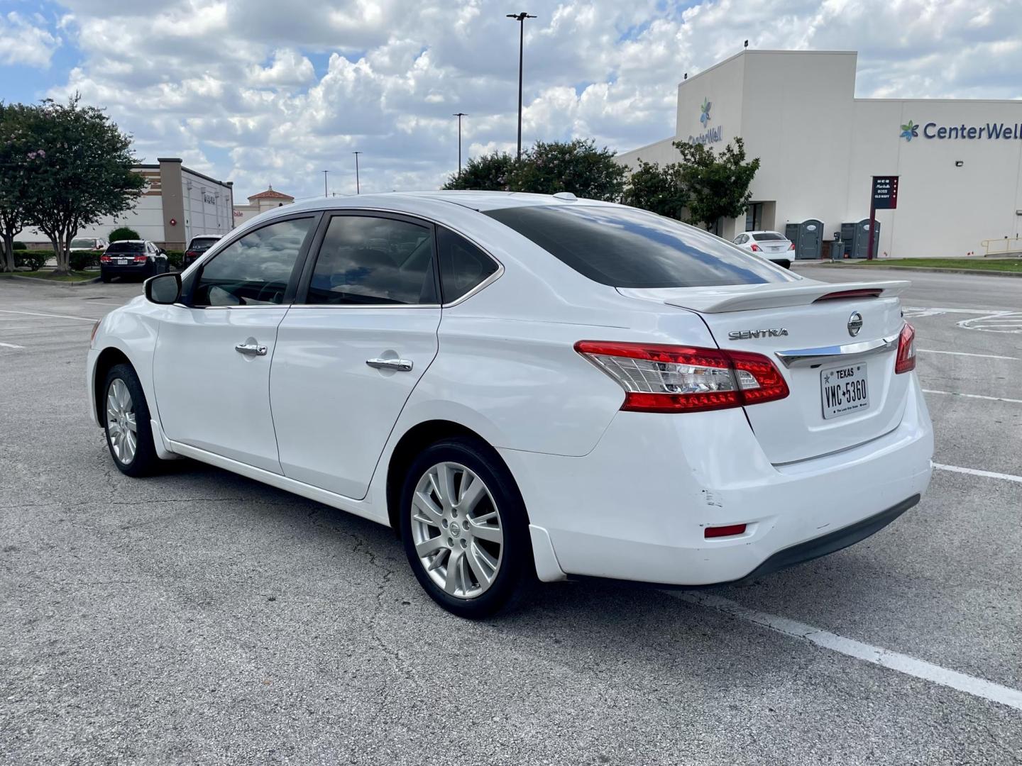 2015 white Nissan Sentra S 6MT (3N1AB7AP3FY) with an 1.8L L4 SFI DOHC 16V engine, 6-Speed Manual transmission, located at 5005 Telephone Rd., Houston, TX, 77087, (713) 641-0980, 29.690666, -95.298683 - Photo#1