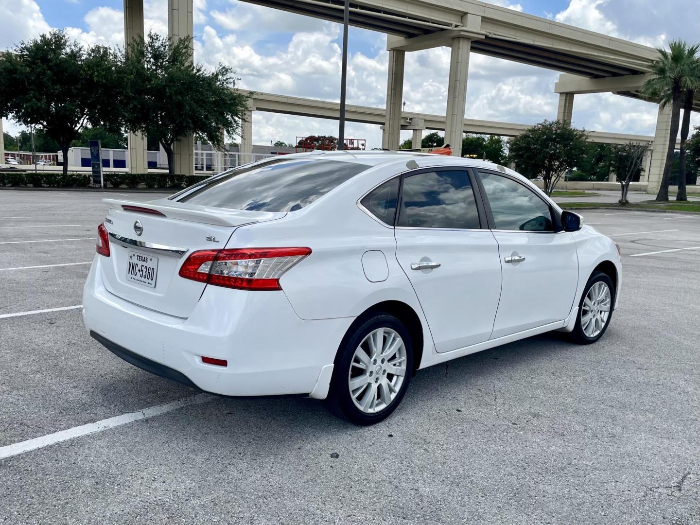 2015 white Nissan Sentra S 6MT (3N1AB7AP3FY) with an 1.8L L4 SFI DOHC 16V engine, 6-Speed Manual transmission, located at 5005 Telephone Rd., Houston, TX, 77087, (713) 641-0980, 29.690666, -95.298683 - Photo#2