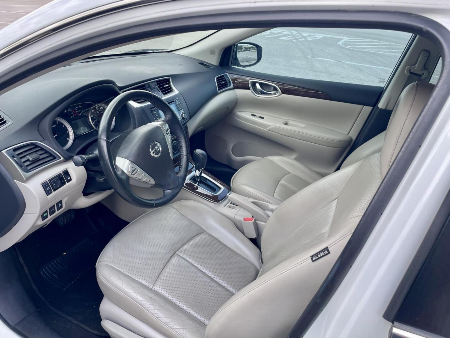2015 white Nissan Sentra S 6MT (3N1AB7AP3FY) with an 1.8L L4 SFI DOHC 16V engine, 6-Speed Manual transmission, located at 5005 Telephone Rd., Houston, TX, 77087, (713) 641-0980, 29.690666, -95.298683 - Photo#4