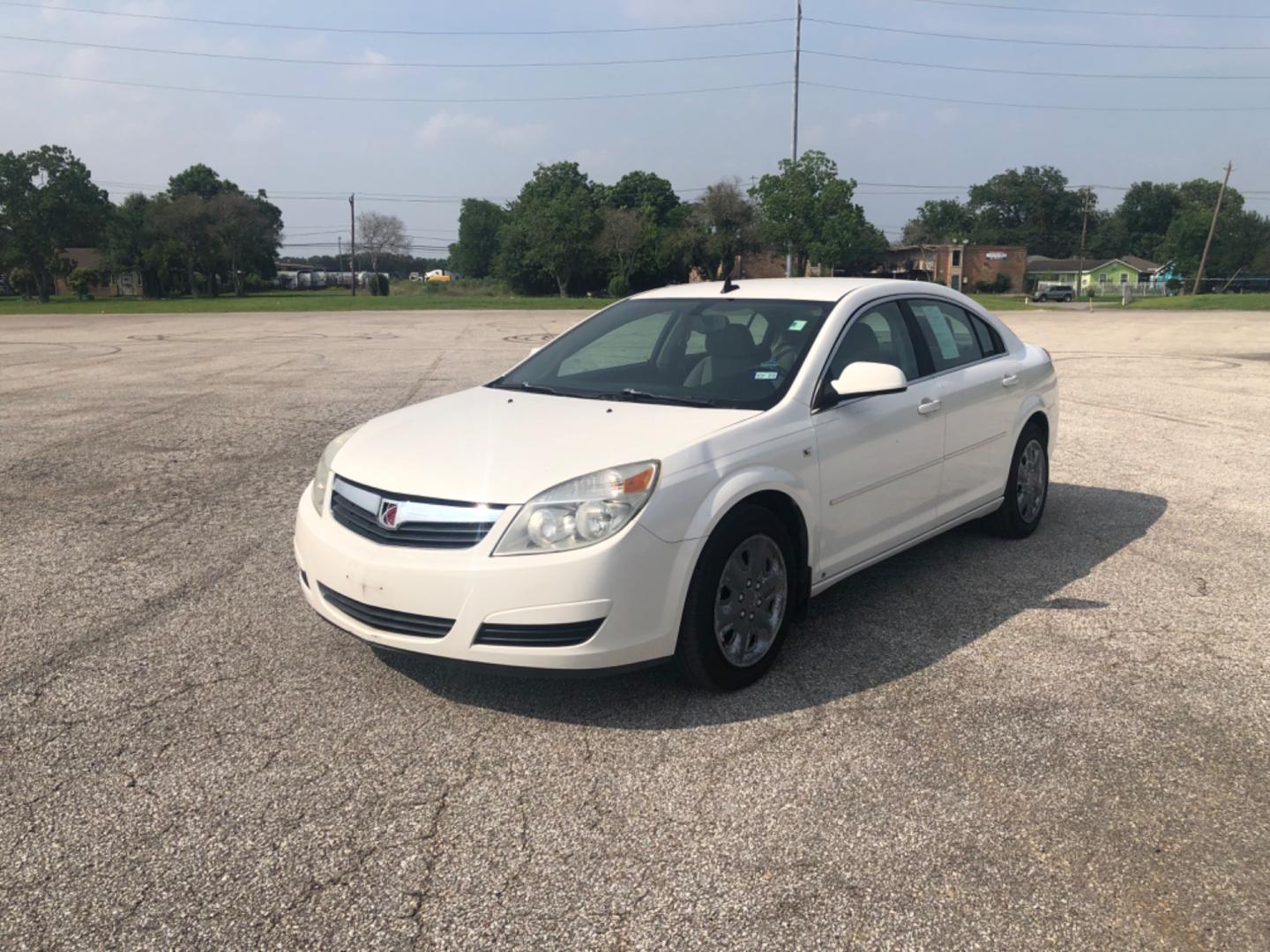 2008 white Saturn Aura XE with an 3.5L V6 12V OHV engine, 4-Speed Automatic Overdrive transmission, located at 5005 Telephone Rd., Houston, TX, 77087, (713) 641-0980, 29.690666, -95.298683 - Photo#1