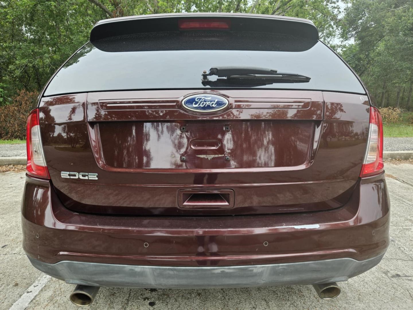 2012 Maroon Ford Edge SE FWD (2FMDK3GC6CB) with an 3.5L V6 DOHC 24V engine, 6-Speed Automatic transmission, located at 5005 Telephone Rd., Houston, TX, 77087, (713) 641-0980, 29.690666, -95.298683 - Photo#4