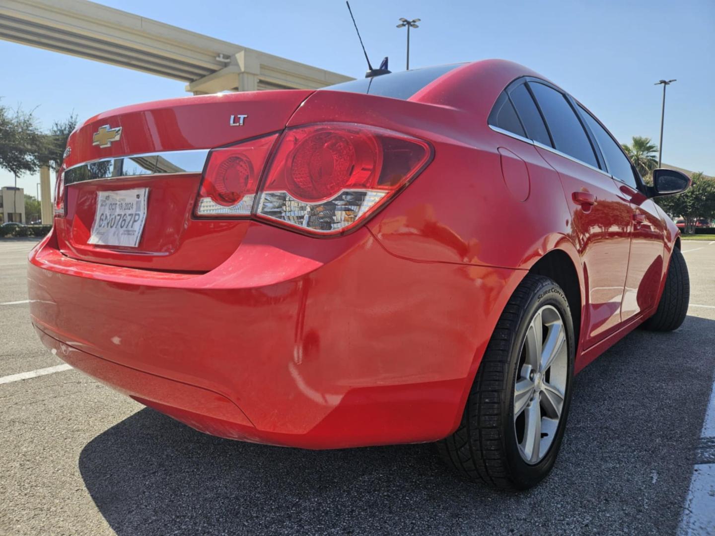 2015 Red Chevrolet Cruze (1G1PE5SB7F7) , located at 5005 Telephone Rd., Houston, TX, 77087, (713) 641-0980, 29.690666, -95.298683 - Photo#2