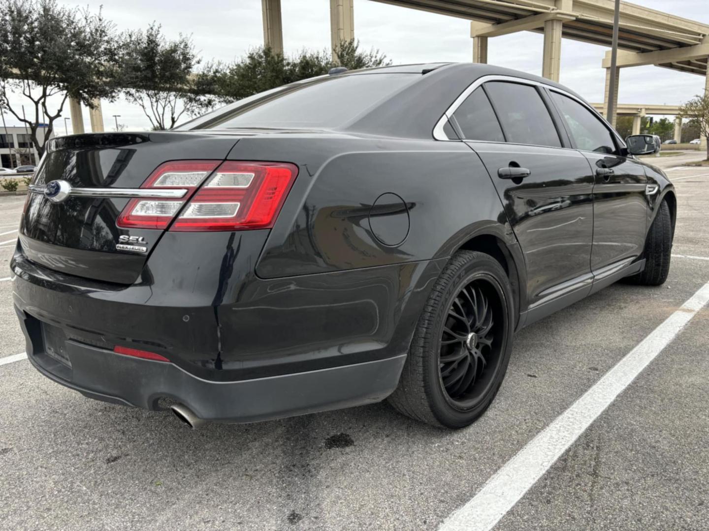 2015 Black Ford Taurus (1FAHP2E87FG) , located at 5005 Telephone Rd., Houston, TX, 77087, (713) 641-0980, 29.690666, -95.298683 - Photo#4