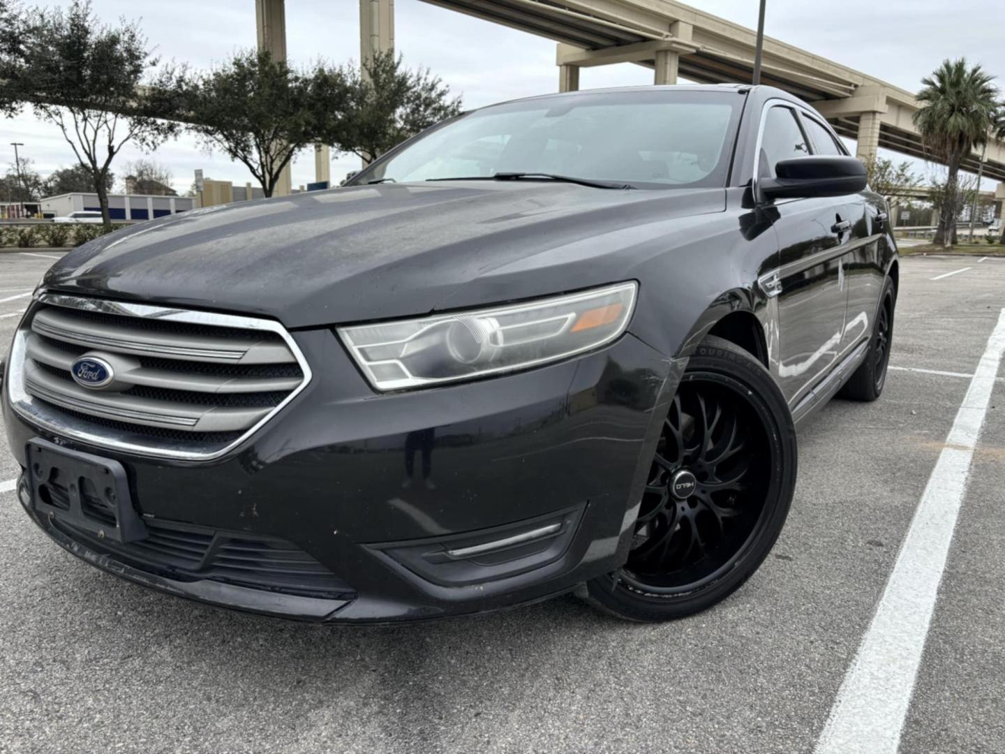 2015 Black Ford Taurus (1FAHP2E87FG) , located at 5005 Telephone Rd., Houston, TX, 77087, (713) 641-0980, 29.690666, -95.298683 - Photo#0