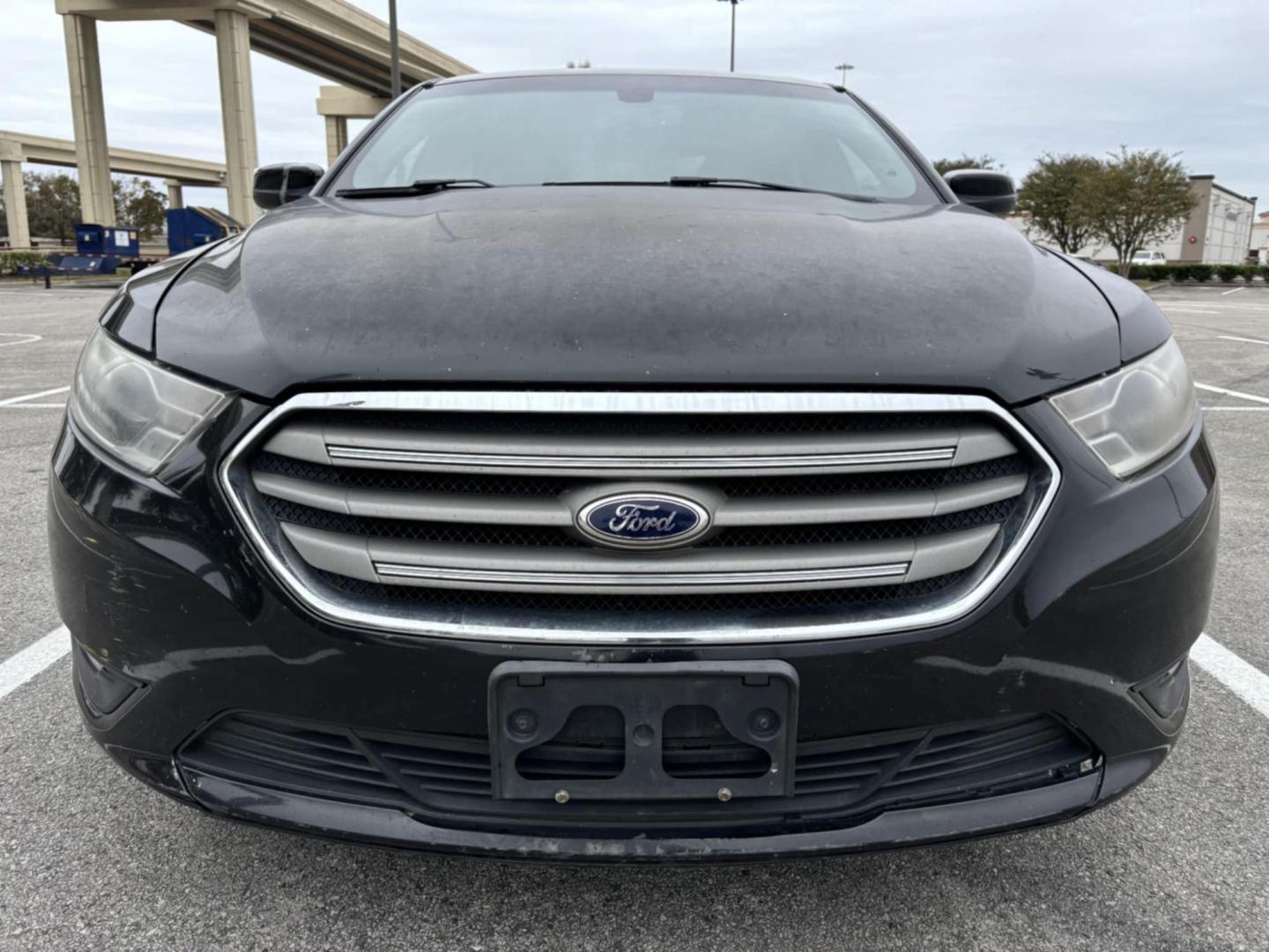 2015 Black Ford Taurus (1FAHP2E87FG) , located at 5005 Telephone Rd., Houston, TX, 77087, (713) 641-0980, 29.690666, -95.298683 - Photo#1