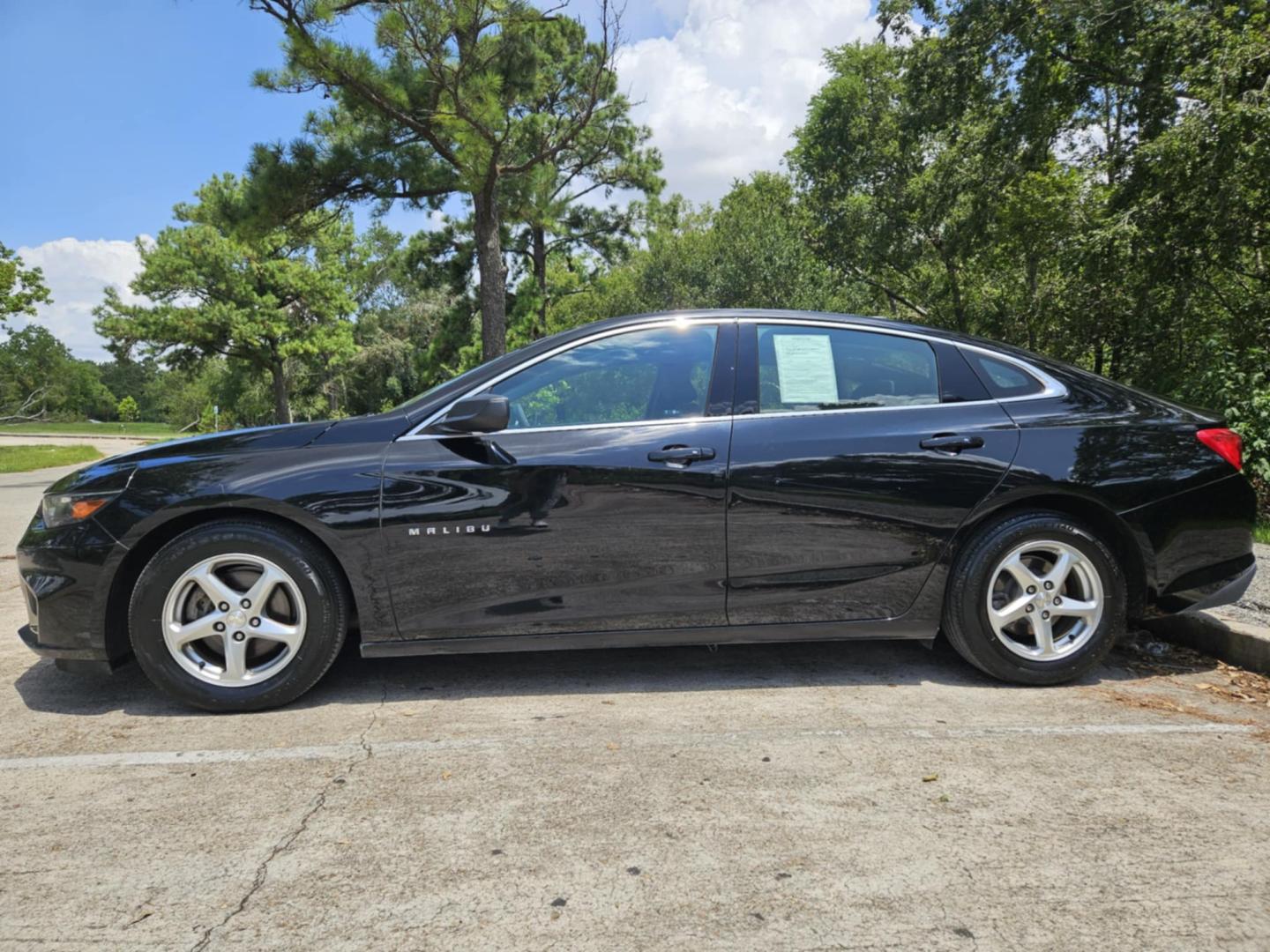 2017 Black Chevrolet Malibu (1G1ZB5ST1HF) , located at 5005 Telephone Rd., Houston, TX, 77087, (713) 641-0980, 29.690666, -95.298683 - Photo#2