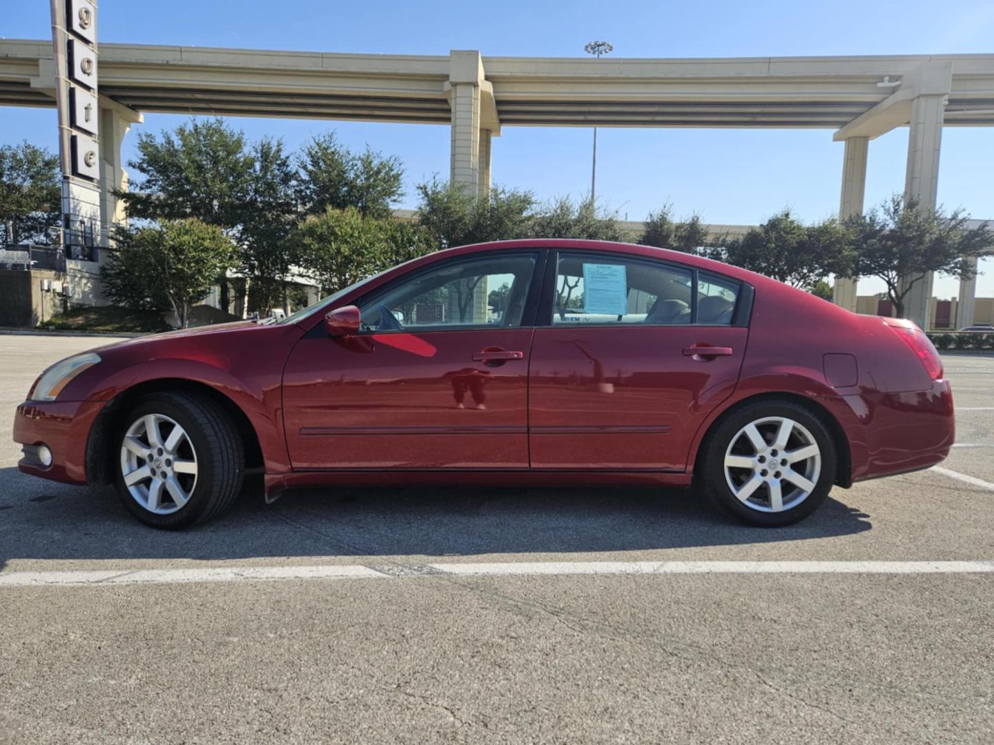 2005 Red Nissan Maxima SE (1N4BA41EX5C) with an 3.5L V6 DOHC 24V engine, 5-Speed Automatic Overdrive transmission, located at 5005 Telephone Rd., Houston, TX, 77087, (713) 641-0980, 29.690666, -95.298683 - Photo#2