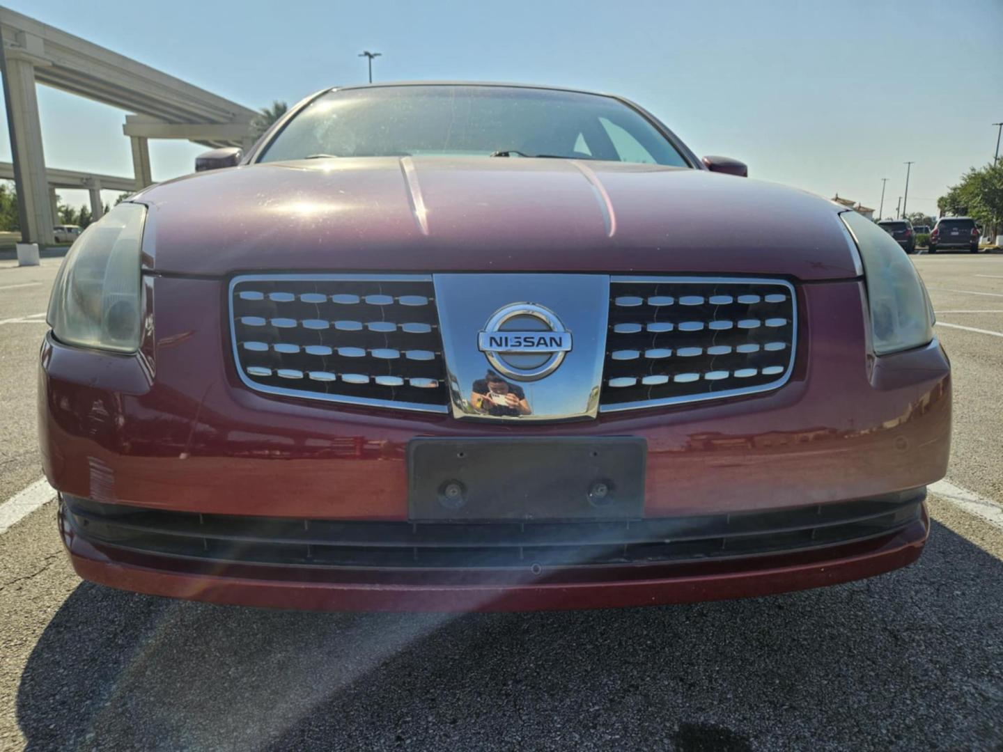 2005 Red Nissan Maxima SE (1N4BA41EX5C) with an 3.5L V6 DOHC 24V engine, 5-Speed Automatic Overdrive transmission, located at 5005 Telephone Rd., Houston, TX, 77087, (713) 641-0980, 29.690666, -95.298683 - Photo#1