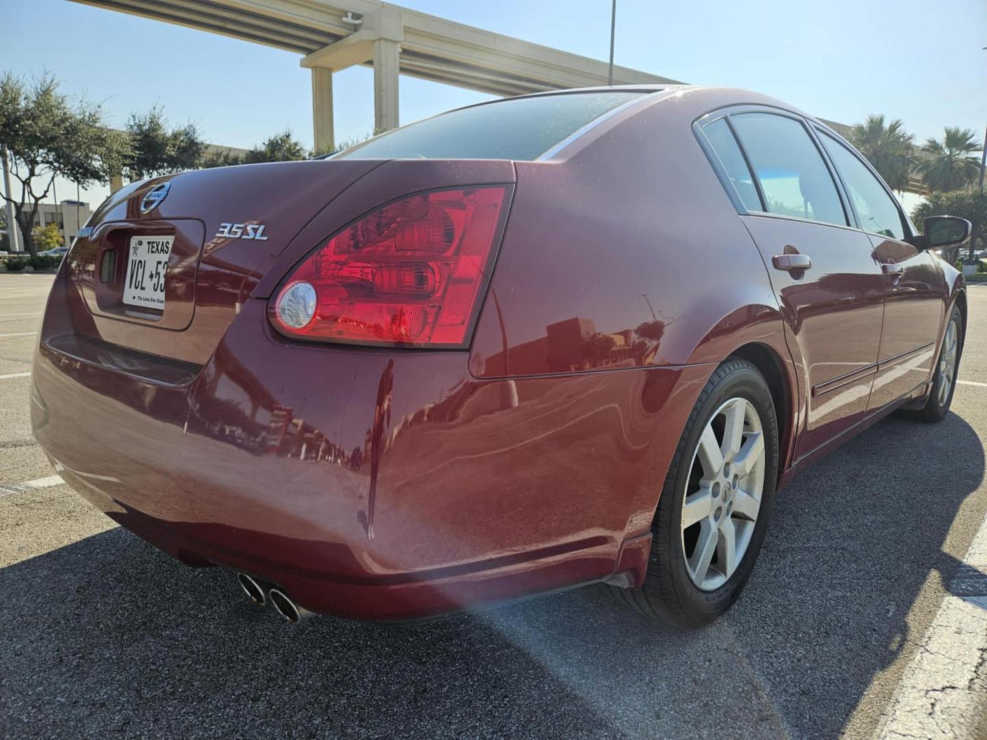 2005 Red Nissan Maxima SE (1N4BA41EX5C) with an 3.5L V6 DOHC 24V engine, 5-Speed Automatic Overdrive transmission, located at 5005 Telephone Rd., Houston, TX, 77087, (713) 641-0980, 29.690666, -95.298683 - Photo#4