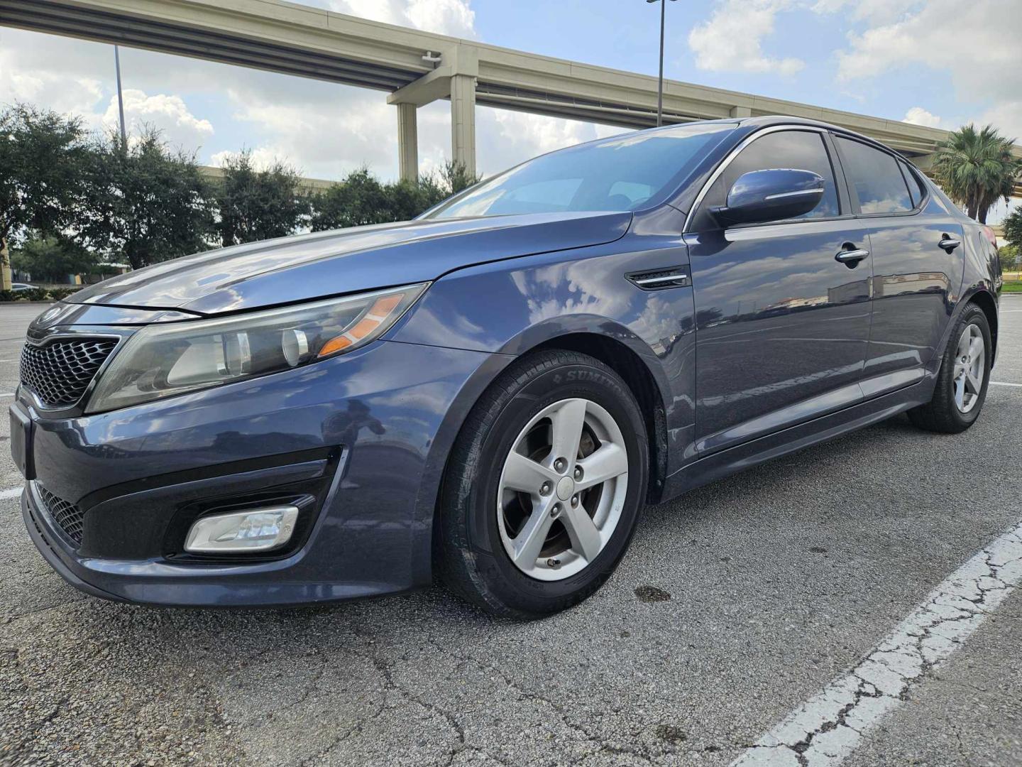 2015 Blue Kia Optima LX (5XXGM4A7XFG) with an 2.4L L4 DOHC 16V engine, 6-Speed Automatic transmission, located at 5005 Telephone Rd., Houston, TX, 77087, (713) 641-0980, 29.690666, -95.298683 - Photo#0