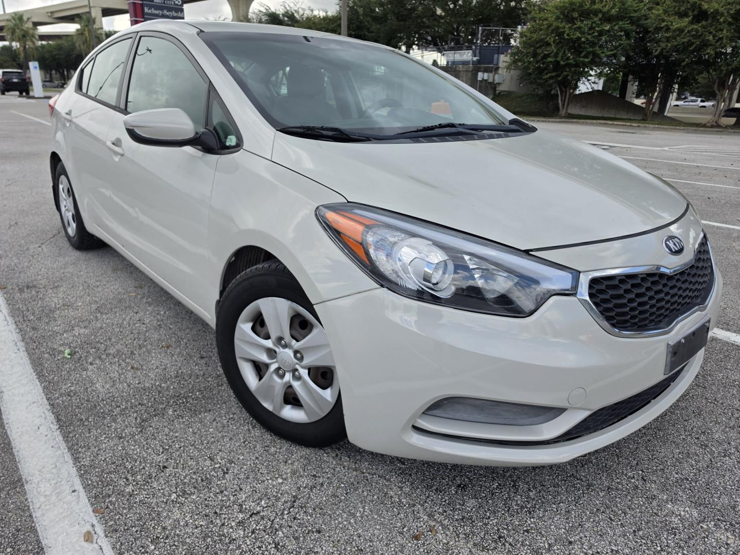 2015 white Kia Forte LX (KNAFK4A61F5) with an 1.8L L4 DOHC 16V engine, located at 5005 Telephone Rd., Houston, TX, 77087, (713) 641-0980, 29.690666, -95.298683- Photo#3