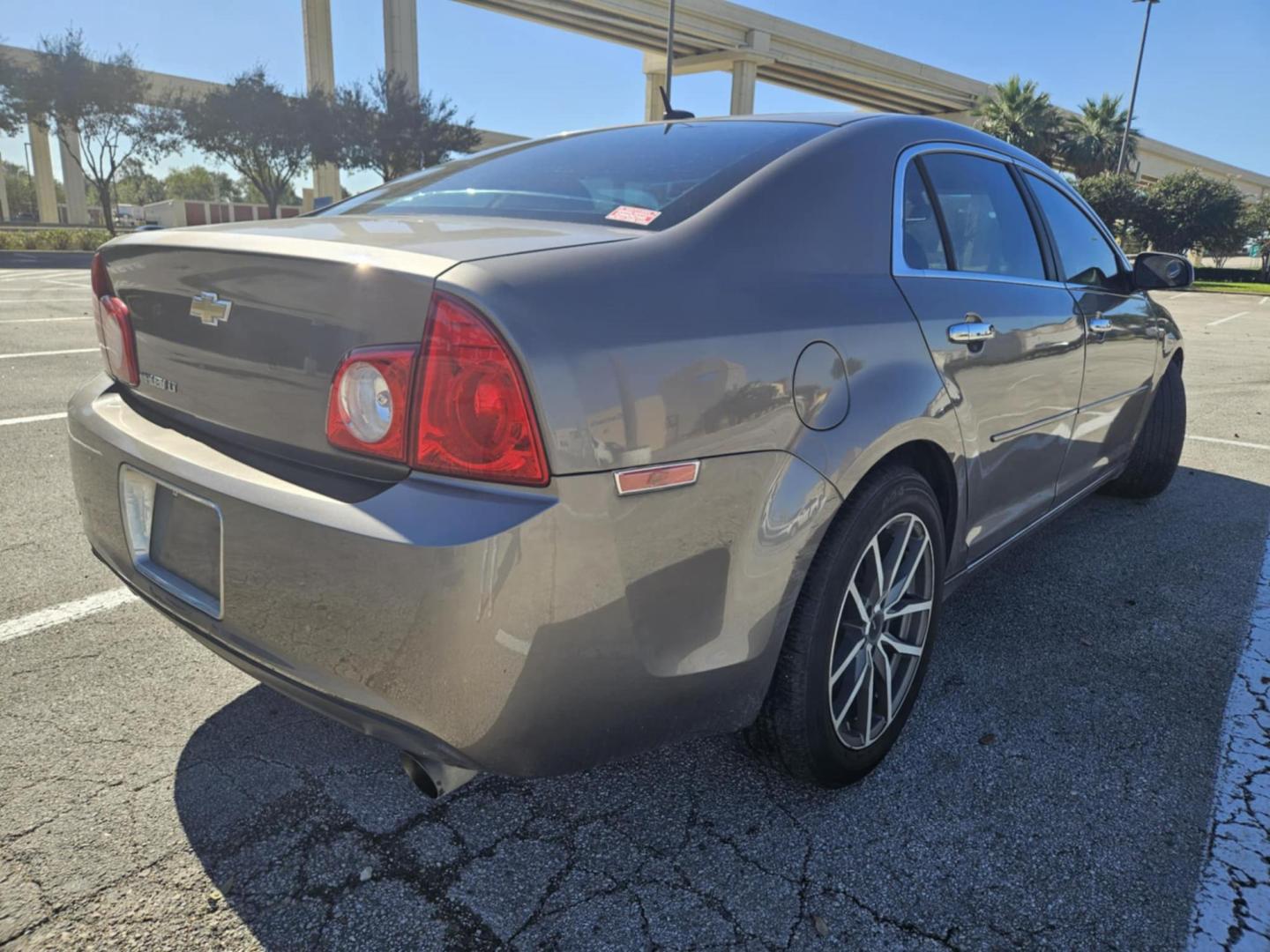 2011 Brown Chevrolet Malibu 2LT (1G1ZD5E75BF) with an 3.6L V6 DOHC 24V engine, 6-Speed Automatic transmission, located at 5005 Telephone Rd., Houston, TX, 77087, (713) 641-0980, 29.690666, -95.298683 - Photo#3