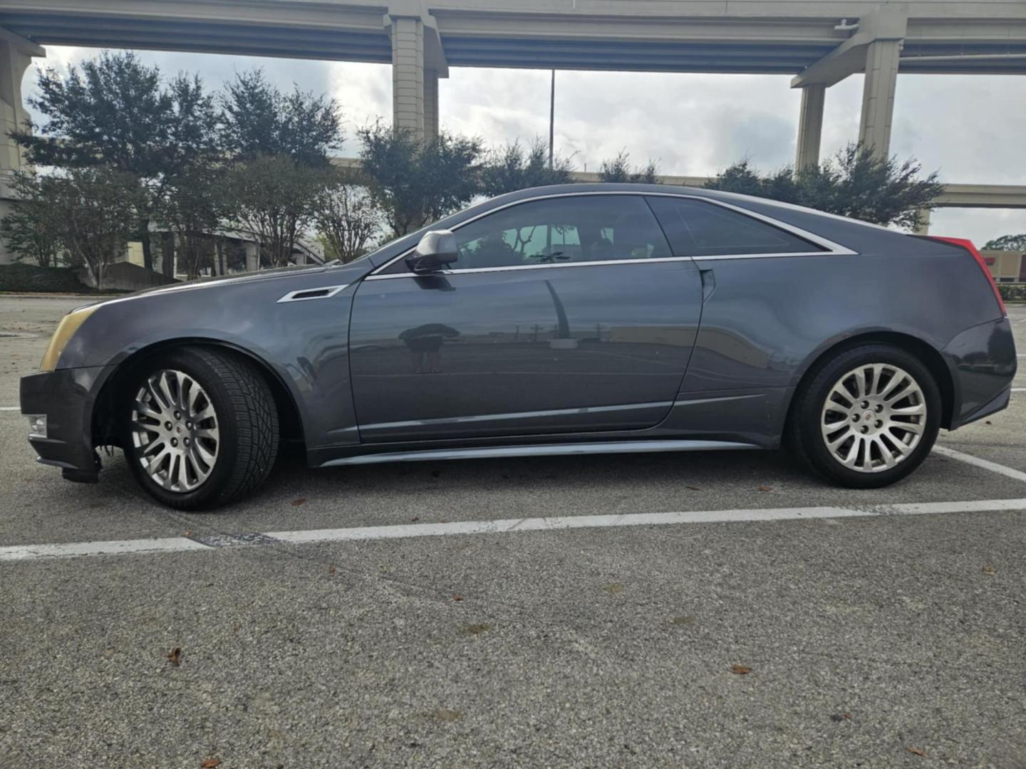 2012 Gray Cadillac CTS Premium w/ Navi (1G6DP1E35C0) with an 3.6L V6 DOHC 24V FFV engine, 6-Speed Automatic transmission, located at 5005 Telephone Rd., Houston, TX, 77087, (713) 641-0980, 29.690666, -95.298683 - Photo#2