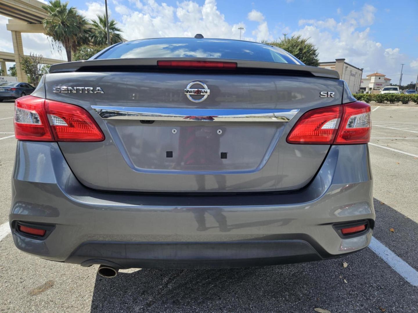 2017 Gray Nissan Sentra S 6MT (3N1AB7AP1HY) with an 1.8L L4 SFI DOHC 16V engine, 6M transmission, located at 5005 Telephone Rd., Houston, TX, 77087, (713) 641-0980, 29.690666, -95.298683 - Photo#4