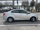 2012 silver Chevrolet Sonic 2LS Sedan (1G1JA5SH1C4) with an 1.8L L4 DOHC 24V FFV engine, 6-Speed Automatic transmission, located at 5005 Telephone Rd., Houston, TX, 77087, (713) 641-0980, 29.690666, -95.298683 - Photo#5
